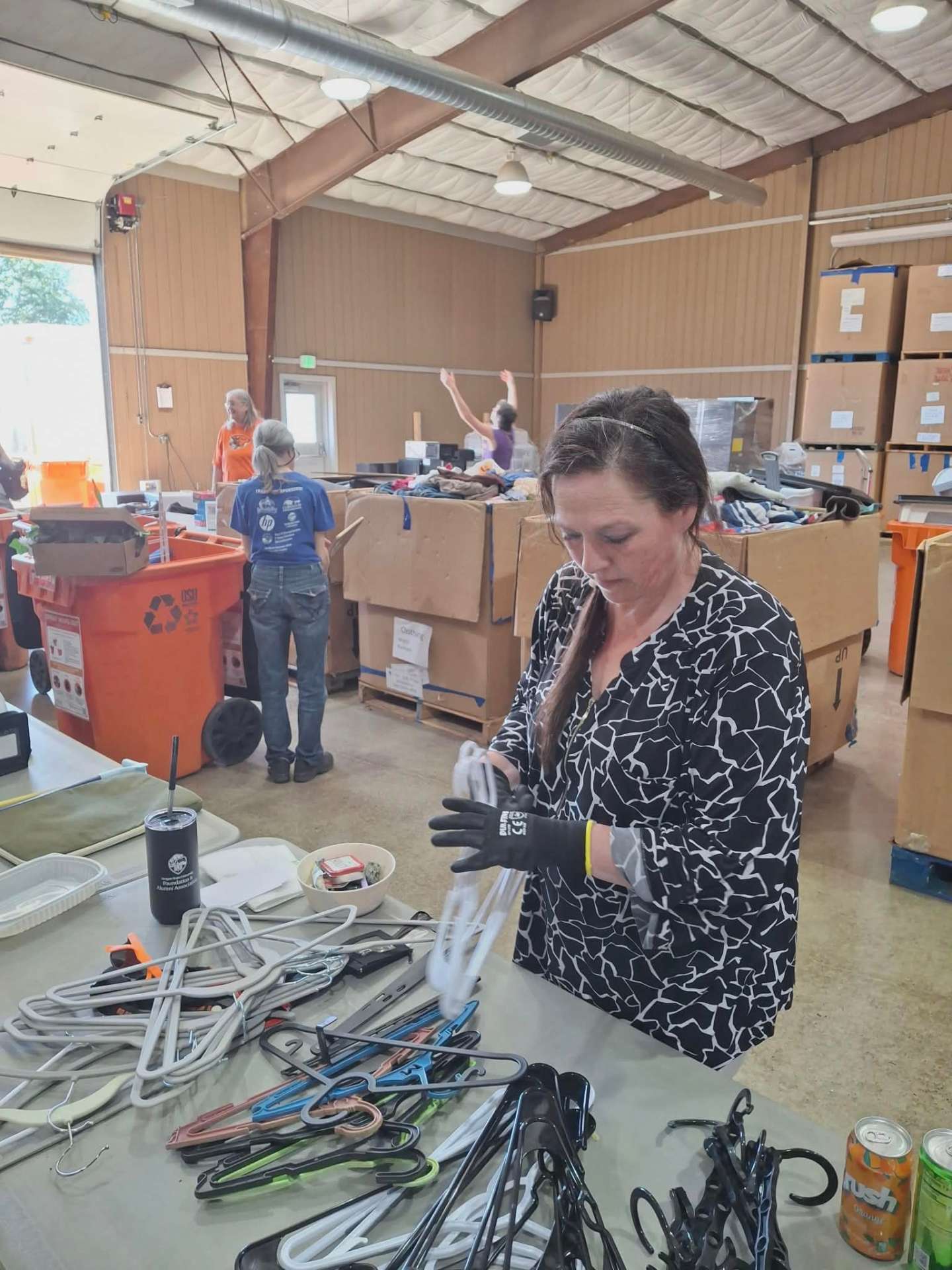 Volunteers organizing housewares